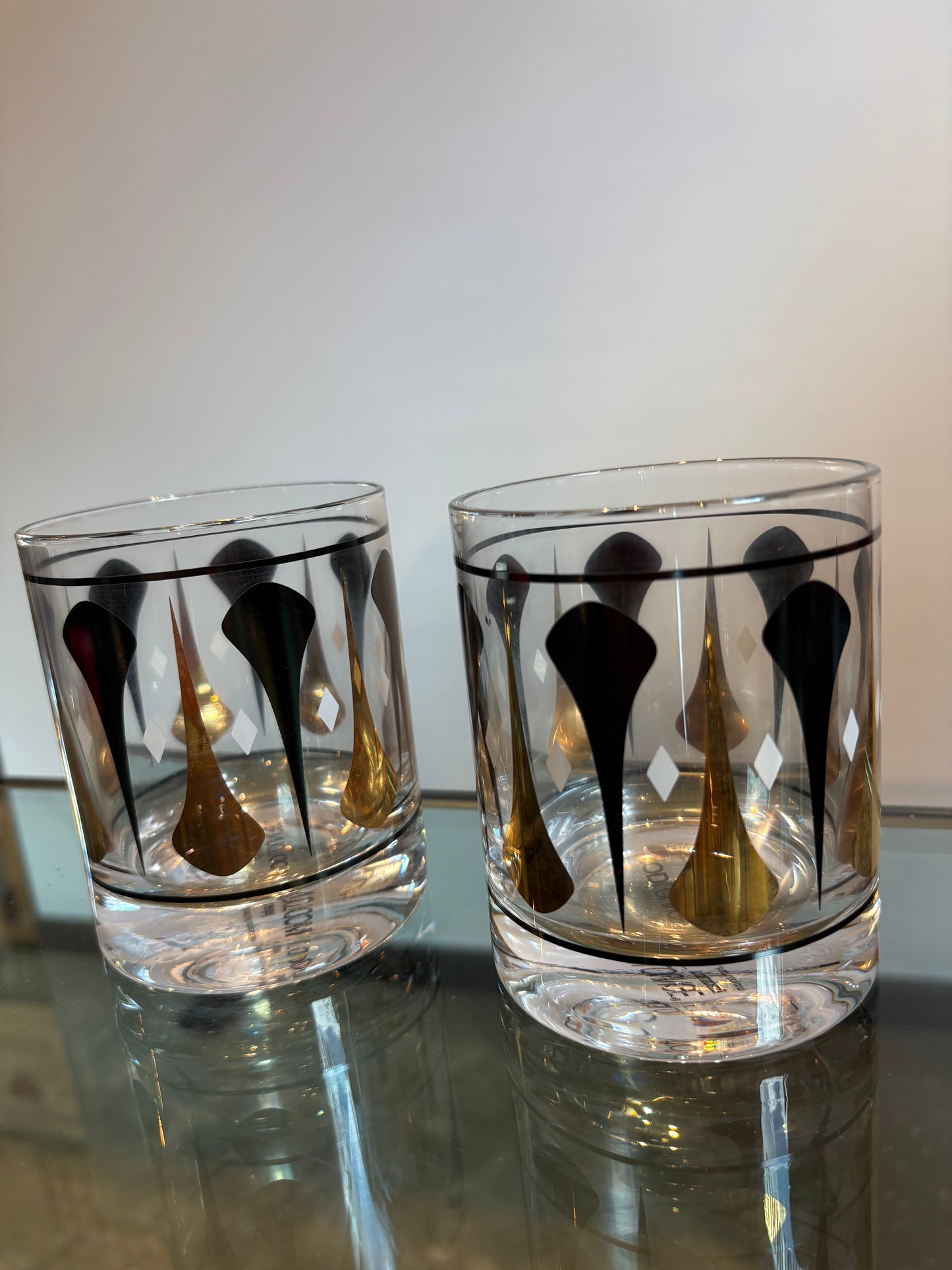 2 BLK AND GOLD MCM WHISKEY