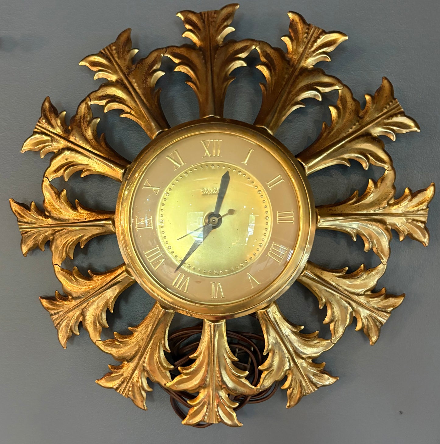 1960s BRASS LEAD STARBURST CLOCK by UNITED