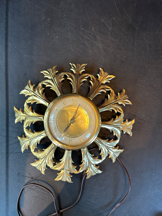 1960s BRASS LEAD STARBURST CLOCK by UNITED